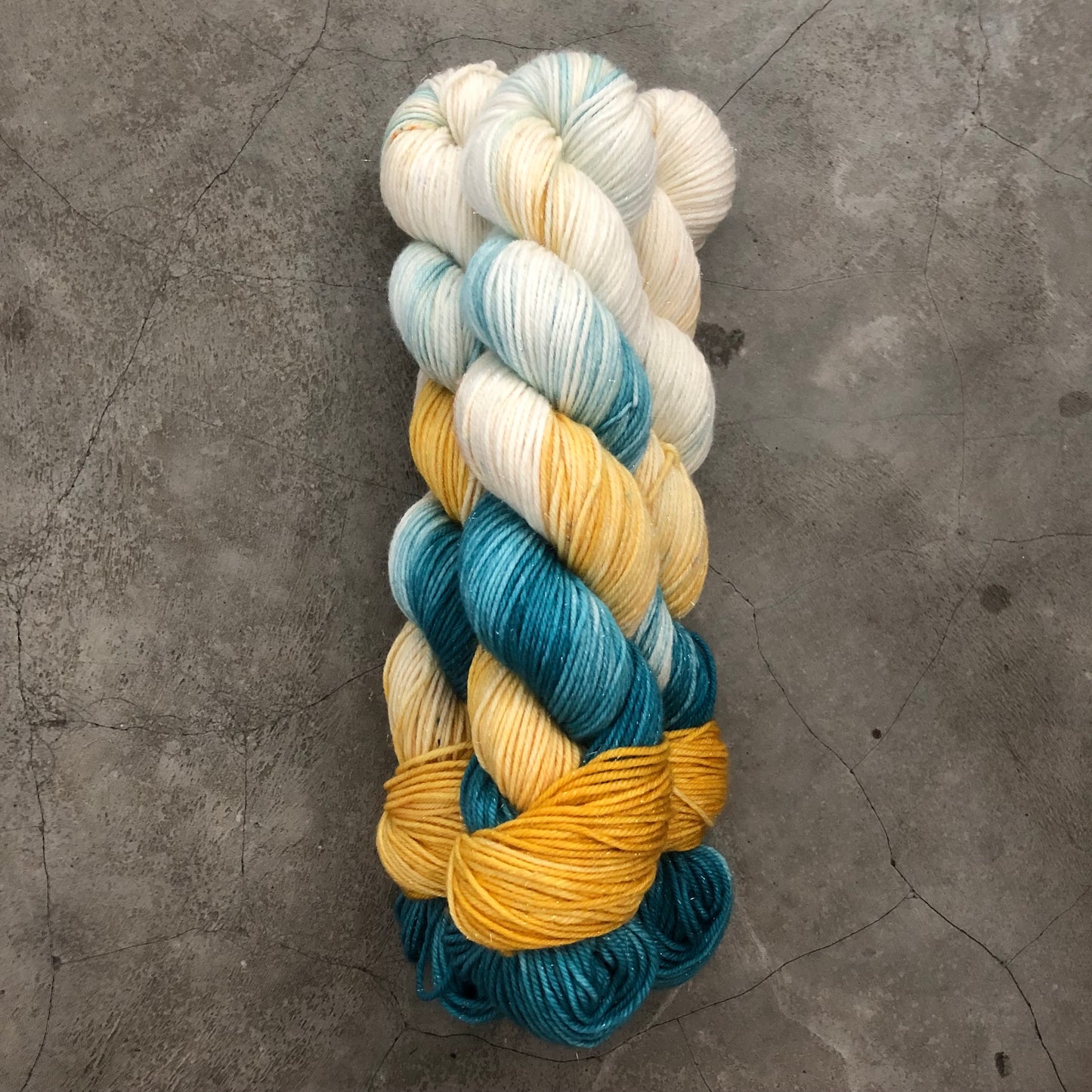 Parkour Kitties Fibers - 75% Fine Superwash Merino, 20% Nylon, 5% Silver Stellina